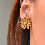 Big Gold Flower Stud Earrings on Ear