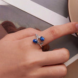 Blue Rose Ring on Finger