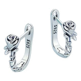 Flower Huggie Earrings Close Up View