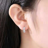 Flower Shaped Hoop Earrings on Ear