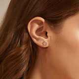 Gold Cherry Blossom Earrings on Ear