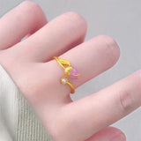 Gold Tulip Ring on Finger
