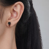 Gothic Rose Earrings on Ear