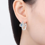 Lotus Blossom Earrings on Ear
