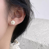 Pearl Flower Stud Earrings on Ear