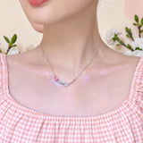 Pink Tulip Necklace Worn Around the Neck