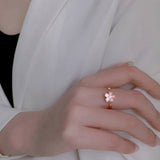 Plum Blossom Ring on Finger