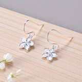 Plumeria Dangle Earrings Close Up View