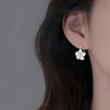 Plumeria_Drop_Earrings_On Ear