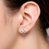Plumeria_Silver_Earrings_on_Ear