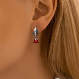 Rose Dangle Earrings on Ear
