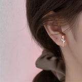 Rose Design Earrings on Ear