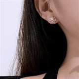 Rose_Gold_Flower_Earrings on Ear