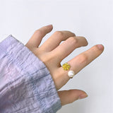 Rose Pearl Ring on Finger