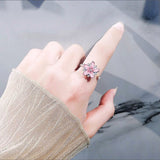 Sakura_Flower_Ring_on_Finger