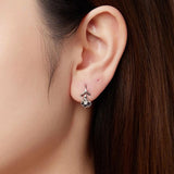 Silver Calla Lily Earrings on Ear