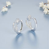 Silver Flower Hoop Earrings Side View